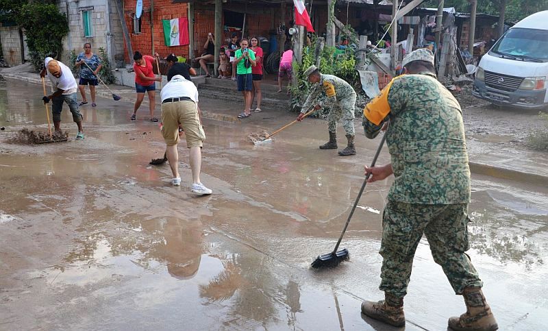 Puerto Vallarta United in Flood Recovery: A Community Effort Puerto Vallarta United in Flood Recovery: A Community Effort