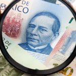 mexican-pesos-magnifying-glass